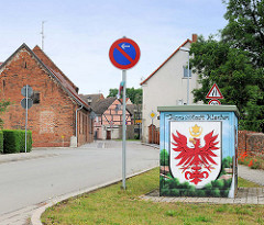 Wappen der Hansestadt Werben / Elbe; roter Adler - goldener Mond.