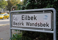 Stadtteilschild Eilbek, Bezirk Wandsbek - weiss mit schwarzer Schrift.