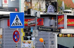 Schilder in der Bahrenfelder Strasse - Stadtteil Hamburg Ottensen.