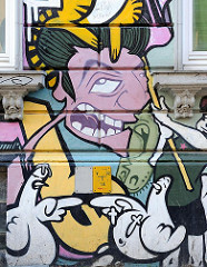 Graffiti an einer Hauswand in Hamburg St. Pauli.