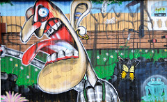 Buntes Graffiti am Luruper Flassbarg.