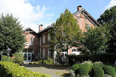 Altes Bauernhof-Gebäude an der Holsteiner Chaussee - Hotel Ausspann.