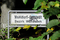 Schild Stadtteilgrenze Wohldorf Ohlstedt, Bezirk Wandsbek.