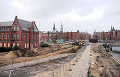 Vorbereitung des Areals um das Gebäude des Amts für Strom und Hafenbau zur Bebauung - Entstehung der Überseequartiers am Magdeburger Hafen.