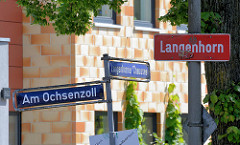 Stadtteilgrenze Schild Langenhorn - Langenhorner Chaussee, Am Ochsenzoll - Bezirk Hamburg Nord.