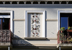 Stuckornamente an der Fassade eines Wohnhauses am Steenwisch.
