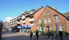 Historisches Backsteinhaus - moderne Neubauten / alt + neu in Buchholz i.d.N. / Caspers Hoff.