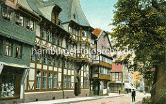 Farbige Fotografie, coloriertes historisches Bild von der Marktstrasse in Goslar - Wohnhäuser, Geschäftshaus - Schindelfassade, Schindeldach.