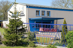 Altes Eingangstor / Metalltür der Zuckerfabrik Klaus Störtebeker in Barth.
