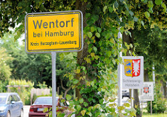 Ortsschild Wentorf bei Hamburg, Kreis Herzogtum Lauenburg - Schild Landesgrenze Schleswig-Holstein + Wappen.