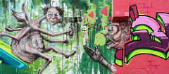 Buntes Graffiti an einer Mauer im Gewerbegebiet beim Stahlwerk in Riesa / Elbe.