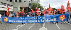 Transparent: G20 = Ausbeutung & Kriege; Gemeinsam für Frieden & Solidarität.