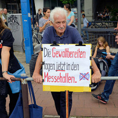 Plakat: Die Gewaltbereiten tagen *jetzt* in den Messehallen - Demonstration am 08. Juli gegen G20 in Hamburg.