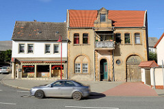 Wohnhäuser am Postplatz / Friedensallee in Mansfeld.