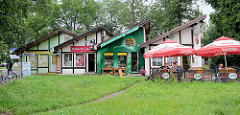 Geschäfte / Pavillions - Kneipe, Blumenladen und Studio Foto; Architektur in Toruń, Polen.