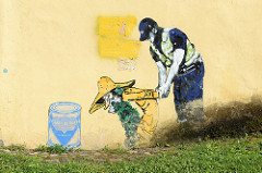 Wandmalerei Edward von Lõngus; Stencil-Graffit in Tartu - Cannabeard und Hexenjäger / Kannahabe ja nõiakütt.