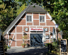 Fachwerkgebäude am Nienstedtener Marktplatz im Hamburger Stadtteil Nienstedten, jetzt Nutzung als Gaststätte / Restaurant.