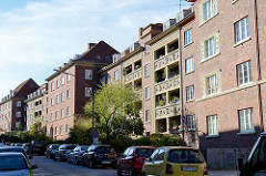 Baudenkmal in der Mergellstraße von Hamburg Harburg, der Siedlungsbau wurde 1928 errichtet. Die jetzt denkmalgeschützten Wohngebäude wurden von dem Architekten Ernst Schnell entworfen. Den Fassadenschmuck / keramischen Bauschmuck hat Richard Kuöhl ge