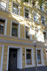 Historisches  Mehrfamilienhaus in der Baererstraße im Hamburger Stadtteil Harburg, errichtet 1890. Das Gebäude steht als Baudenkmal Hamburgs unter Denkmalschutz.