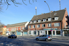 Teilweise leerstehende Wohnungen und Geschäfte in der Langenhorner Chaussee im Hamburger Stadtteil Langenhorn.