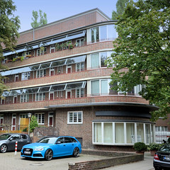 Fotos aus dem Hamburger Stadtteil Dulsberg - Bezirk Hamburg Nord. Runde Kopfbauten mit Laden der Frankschen Laubenganghäuser in der Oberschlesischen Straße; die Gebäude wurden 1931 errichtet und stehen unter Denkmalschutz.