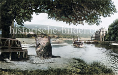 Historische Ansicht von Zusammenfluss der Fulda und Werra zur Weser - im Hintergrund Speicher und Hafenanlagen.