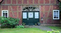 Scheeßel ist eine Ortschaft in der gleichnamigen Gemeinde im Landkreis Rotenburg (Wümme) in Niedersachsen; Fachwerkhaus mit Sinnspruch / Hausspruch am Hauptbalken.