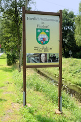 Findorf ist ein Ortsteil der Gemeinde Gnarrenburg im Landkreis Rotenburg (Wümme) in Niedersachsen; Schild Herzlich Willkommen am  Oste-Hamme-Kanal.
