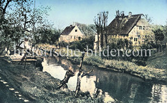 Historische Bilder vom Fluss Lühe im Landkreis Stade in Niedersachsen;  colorierte Ansicht - Ewer und Wohnhäuser.