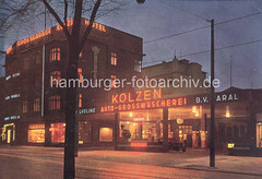 Historische Farbfotografie vom Marktplatz in Hamburg Winterhude. Tankstelle Valvoline / Aral; Grossgarage Kolzen, Hotel.